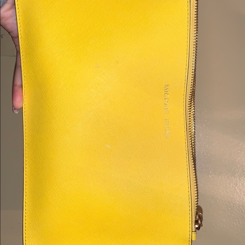 Yellow Michael kors wristlet pouch